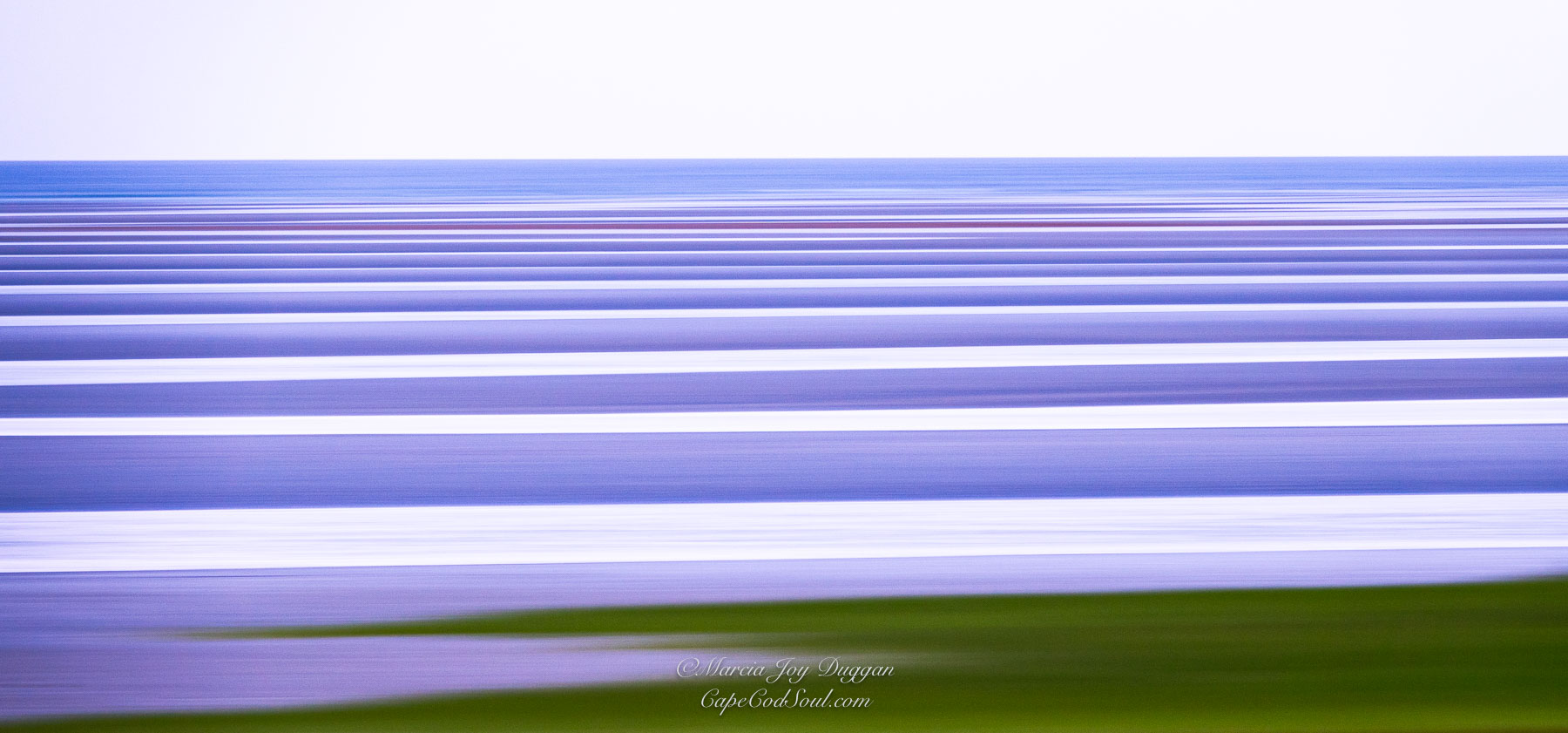 Lavender Bay was photographed during the early morning 'blue hour' along Cape Cod Bay.
