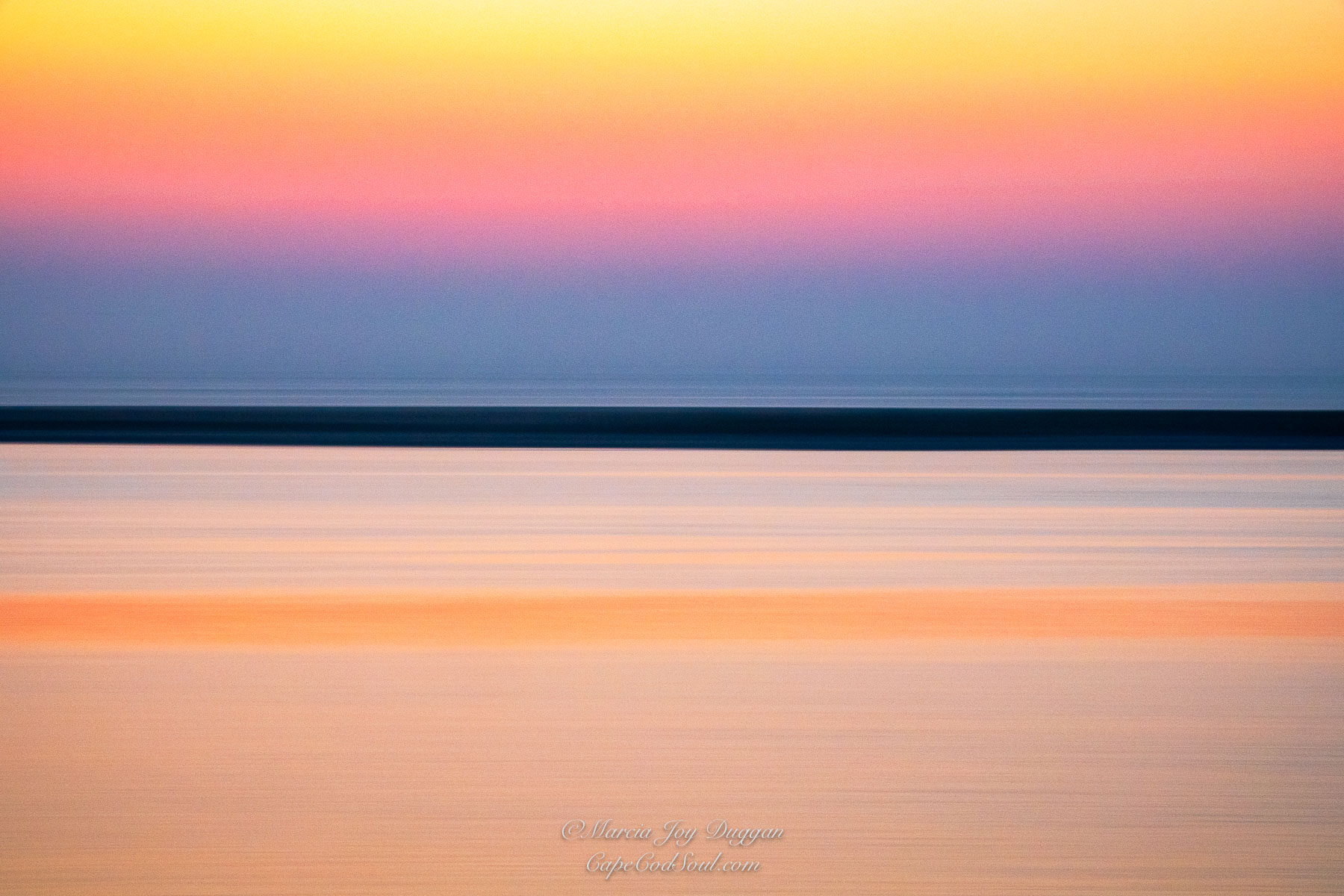 Sunrise Karma was photographed during the 'blue hour' along the ocean on Cape Cod.